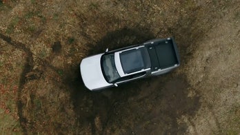 The electric Rivian R1T pickup spins like a tank