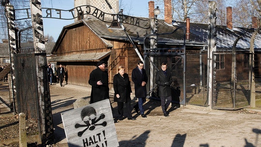 Germany's Angela Merkel visits Auschwitz for first time amid rising anti-Semitism