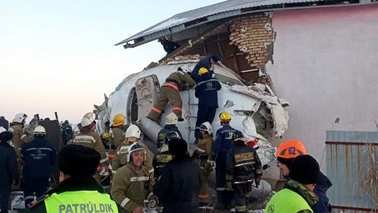 Kazakhstan plane crashes into two-story home after takeoff killing at least 12, injuring 54