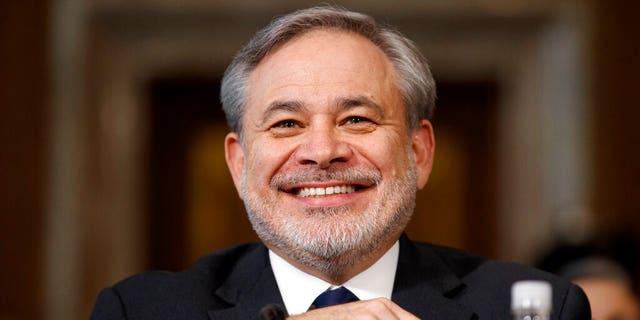 FILE: Secretary of Energy nominee Dan Brouillette smiles during a Senate hearing on his nomination.