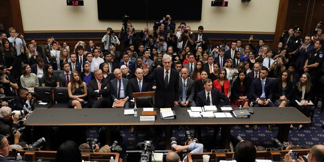 Former special counsel Robert Mueller is sworn in before testifying to the House Judiciary Committee about his report on Russian interference in the 2016 presidential election on Capitol Hill on Wednesday, July 24, 2019, in Washington. (Chip Somodevilla/Pool Photo via AP)
