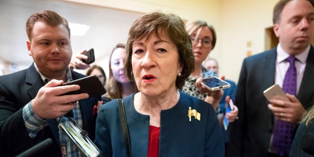In this Nov. 6, 2019, file photo, Sen. Susan Collins, R-Maine, is surrounded by reporters as she heads to vote at the Capitol in Washington. Collins co-authored a letter supporting the legislative filibuster in 2017, and her office says she still believes it should remain in place.  (AP Photo/J. Scott Applewhite, File)