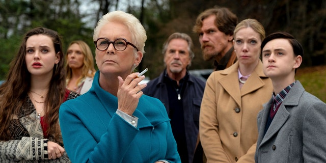 Katherine Langford, Toni Collette, Jamie Lee Curtis, Don Johnson, Michael Shannon, Riki Lindholm and Jaeden Lieberher in a scene from "Knives Out." (Claire Folger/Lionsgate via AP)