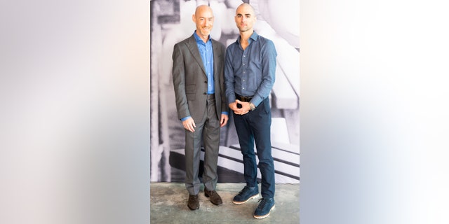 Elizabeth Taylor's assistant Tim Mendelson (left) with her grandson Quinn Tivey.