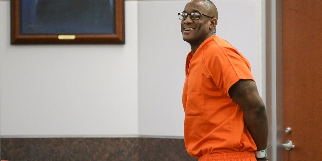 FILE - In this Tuesday, Nov. 26, 2019 file photo, Lydell Grant smiles in court after he was ordered to be released on bond in Houston. He was cleared Friday by authorities in the death of 28-year-old Aaron Scheerhoorn. New evidence has pointed to 41-year-old Jermarico Carter as the killer. Carter was arrested Thursday in Georgia. (Jon Shapley/Houston Chronicle via AP)