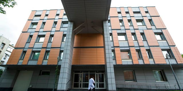 An employee walks into the building of the Russia's national drug-testing laboratory in Moscow, Russia, on May 24, 2016.