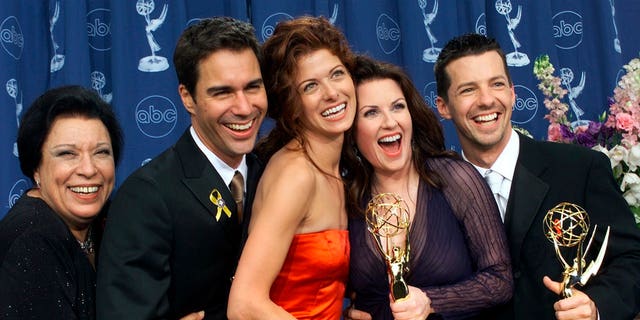 Shelley Morrison, from left, Eric McCormack, Debra Messing, Megan Mullally and Sean Hayes celebrate their awards for their work in "Will &amp; Grace" at the 52nd annual Primetime Emmy Awards in Los Angeles. Morrison, an actress with a 50-year career who was best known for playing a memorable maid on “Will and Grace,” has died. Publicist Lori DeWaal says Morrison died Sunday, Dec. 1, 2019, at Cedars-Sinai Medical Center in Los Angeles from heart failure. She was 83.