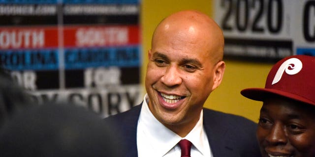 Ex-Democratic presidential contender Cory Booker poses for photos after a black men's round table on Monday, Dec. 2, 2019, in Columbia, S.C. Booker is a member of the Senate Judiciary Committee which will play a key role in vetting any Supreme Court nominee from President Trump. (AP Photo/Meg Kinnard)