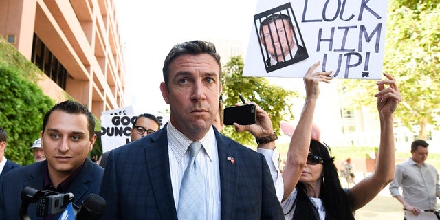 U.S. Rep. Duncan Hunter leaves San Diego federal court this past July. (AP Photo/Denis Poroy, File)