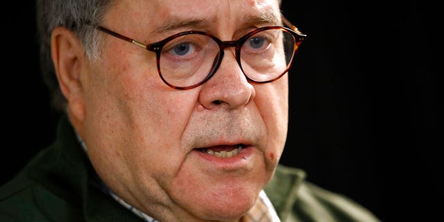 Attorney General William Barr speaks with members of the press in Montana last month.