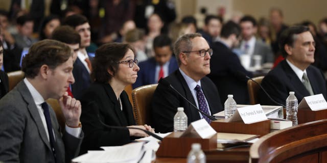 From left: Constitutional law experts Harvard Law School professor Noah Feldman, Stanford Law School professor Pamela Karlan, University of North Carolina Law School professor Michael Gerhardt and George Washington University Law School professor Jonathan Turley during a hearing before the House Judiciary Committee on the constitutional grounds for the impeachment of President Trump. (AP Photo/Andrew Harnik)