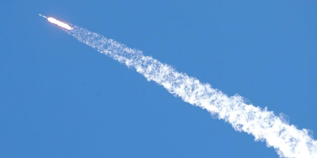 A Falcon 9 SpaceX rocket on a resupply mission to the International Space Station soars skyward after liftoff from Space Launch Complex 40 at Cape Canaveral. (AP Photo/John Raoux)