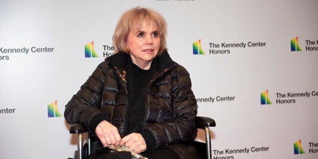 2019 Kennedy Center Honoree singer Linda Ronstadt arrives at the State Department for the Kennedy Center Honors State Department Dinner on Saturday, Dec. 7, 2019. (AP Photo/Kevin Wolf)