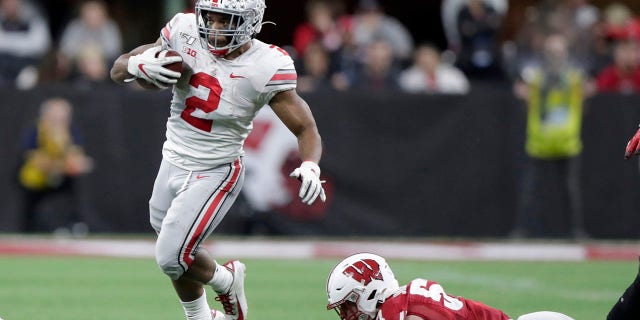 The Ravens select J.K. Dobbins. (AP Photo/Michael Conroy)