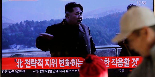 People watch a TV news program reporting North Korea's announcement with a file footage of North Korean leader Kim Jong Un, at the Seoul Railway Station in Seoul, South Korea, Sunday, Dec. 8, 2019. The letters, top left, read "North. Very important test." (Associated Press)