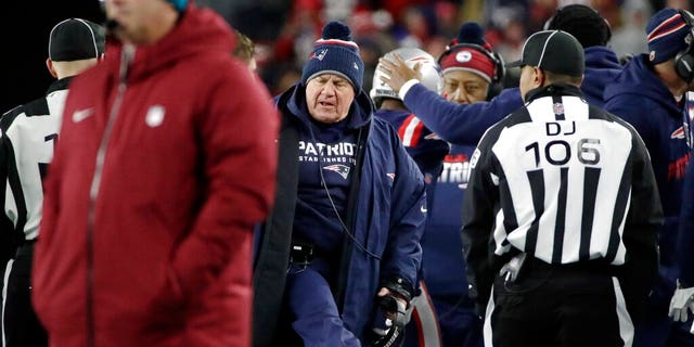 New England Patriots head coach Bill Belichick, center, argues a call in the second half of an NFL football game against the Kansas City Chiefs, Sunday. (AP Photo/Elise Amendola)