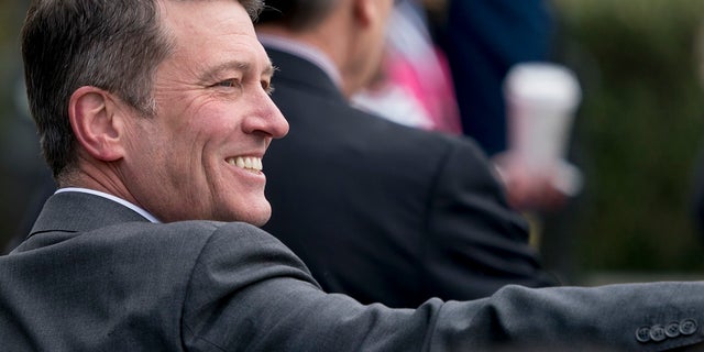 In this April 2, 2018, file photo, then-White House physician and nominee for Veterans Affairs Secretary Dr. Ronny Jackson arrives at the annual White House Easter Egg Roll on the South Lawn of the White House in Washington. Jackson is running as a Republican in 2020 for a rural congressional seat in Texas. (AP Photo/Andrew Harnik, File)
