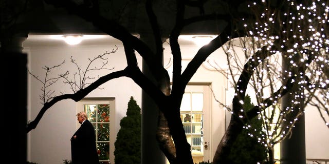 President Trump walking from the Oval Office as he headed to speak with reporters on the South Lawn of the White House before departing for the Pennsylvania rally Tuesday. (AP Photo/ Evan Vucci)