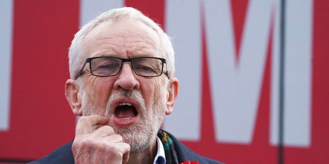 Labour Party leader Jeremy Corbyn gestures, at a rally in Stainton Village, on the last day of General Election campaigning, in Middlesbrough, England, Wednesday, Dec. 11, 2019. (Owen Humphreys/PA via AP)