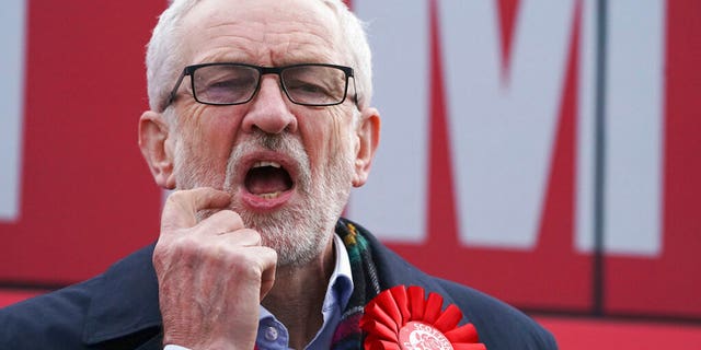 Labour Party leader Jeremy Corbyn gestures, at a rally in Stainton Village, on the last day of General Election campaigning, in Middlesbrough, England, Wednesday, Dec. 11, 2019. (Owen Humphreys/PA via AP)