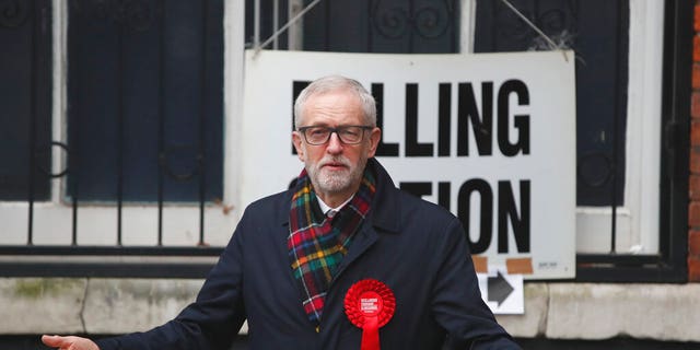 British opposition Labour Party leader Jeremy Corbyn, gestures after casting his vote in the general election, in Islington, London, England, Thursday, Dec. 12, 2019. (AP Photo/Thanassis Stavrakis)