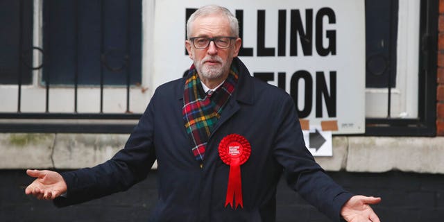 British opposition Labour Party leader Jeremy Corbyn, gestures after casting his vote in the general election, in Islington, London, England, Thursday, Dec. 12, 2019. (AP Photo/Thanassis Stavrakis)