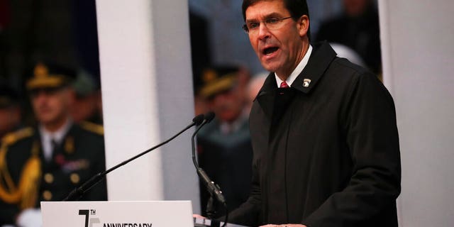 U.S. Secretary of Defence Mark Esper gives a speech during a ceremony to commemorate the 75th anniversary of the Battle of the Bulge at the Mardasson Memorial in Bastogne, Belgium