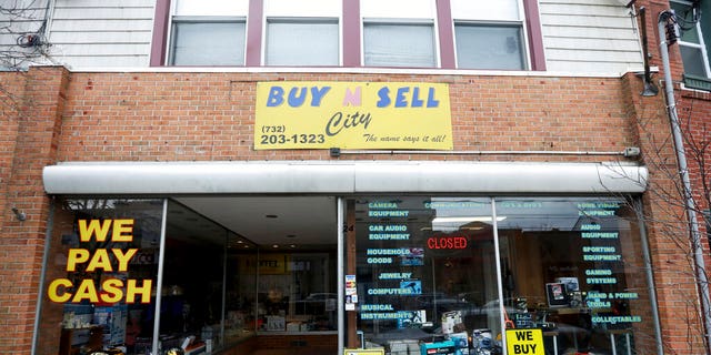 This photo shows the family-owned Buy n Sell pawnshop searched by the FBI over the weekend in Keyport, N.J. 