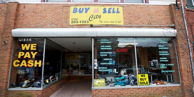 This photo shows the family-owned Buy n Sell pawnshop searched by the FBI over the weekend in Keyport, N.J. 