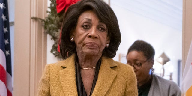 Rep. Maxine Waters, D-Calif., leaves a leadership meeting as the Democratic-controlled House of Representatives begins a day of debate on the impeachment charges against President Donald Trump for abuse of power and obstruction of Congress, at the Capitol in Washington, Wednesday, Dec. 18, 2019. (AP Photo/J. Scott Applewhite)