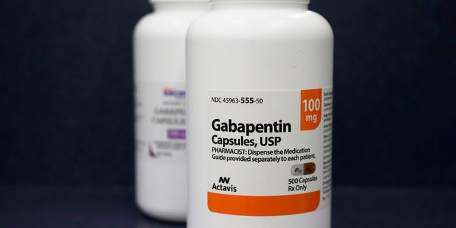 FILE - This Thursday, May 3, 2018 file photo shows bottles of gabapentin at a pharmacy in San Francisco. On Thursday, Dec. 18, 2019, U.S. health regulators are warning that popular nervous system medications known generically as gabapentin and pregabalin can cause dangerous breathing problems when combined with opioids and certain other drugs.