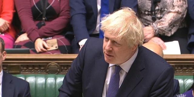 British Prime Minister Boris Johnson speaks during the Brexit debate on The European Union (Withdrawal Agreement) Bill in the House of Commons in London, Friday Dec. 20, 2019. (House of Commons via AP)