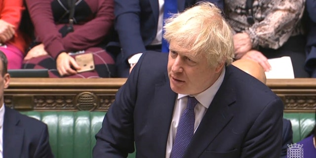 British Prime Minister Boris Johnson speaks during the Brexit debate on The European Union (Withdrawal Agreement) Bill in the House of Commons in London, Friday Dec. 20, 2019. (House of Commons via AP)