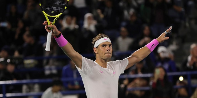 Rafael Nadal from Spain celebrates after defeating Stefanos Tsitsipas of Greece at the final match of the Mubadala World Tennis Championship in Abu Dhabi, United Arab Emirates, Saturday, Dec. 21, 2019. (AP Photo/Kamran Jebreili)