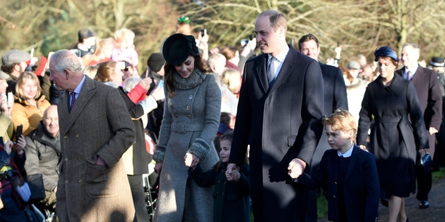 Britain's Prince Charles, Kate, Duchess of Cambridge, Prince William and their children Prince George, right, and Princess Charlotte arrive to attend the Christmas Day morning church service at St. Mary Magdalene Church in Sandringham, Norfolk, England, Wednesday, Dec. 25, 2019. (Joe Giddens/PA via AP)