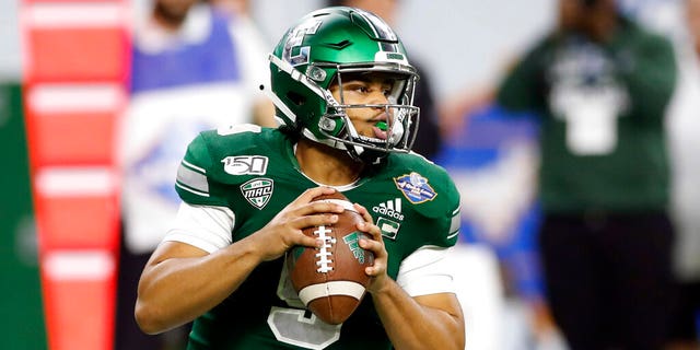 Eastern Michigan quarterback Mike Glass III looks downfield during the first half of the Quick Lane Bowl NCAA college football game against Pittsburgh, Thursday, Dec. 26, 2019, in Detroit. 