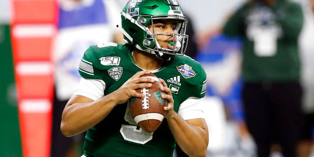 Eastern Michigan quarterback Mike Glass III looks downfield during the first half of the Quick Lane Bowl NCAA college football game against Pittsburgh, Thursday, Dec. 26, 2019, in Detroit.