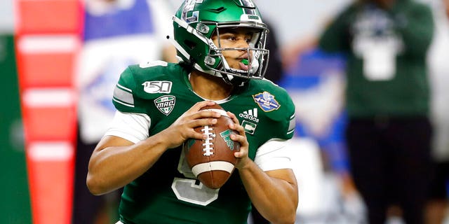 Eastern Michigan quarterback Mike Glass III looks downfield during the first half of the Quick Lane Bowl NCAA college football game against Pittsburgh, Thursday, Dec. 26, 2019, in Detroit. 