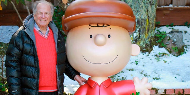 This 2015 photo provided by Jason Mendelson shows Lee Mendelson in Hillsborough, Calif. Lee Mendelson, the producer who changed the face of the holidays when he brought "A Charlie Brown Christmas" to television in 1965 and wrote the lyrics to its signature song, "Christmas Time Is Here," died on Christmas Day, Wednesday, Dec. 25, 2019. (Jason Mendelson via AP)