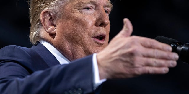 In this Dec. 18, 2019 file photo President Donald Trump speaks during a campaign rally at Kellogg Arena, in Battle Creek, Mich. (AP Photo/ Evan Vucci, File)