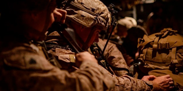 In this photo provided by U.S. Department of Defense, U.S. Marines assigned to Special Purpose Marine Air-Ground Task Force-Crisis Response-Central Command (SPMAGTF-CR-CC) 19.2, preparing to deploy from Kuwait on Tuesday. (U.S. Marine Corps photos by Sgt. Robert G. Gavaldon via AP)