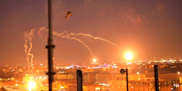 The U.S. Army's AH-64 Apache helicopter from 1st Battalion, 227th Aviation Regiment, 34th Combat Aviation Brigade, conducting overflights of the U.S. Embassy in Baghdad on Tuesday. (U.S. Army photo by Spc. Khalil Jenkins, CJTF-OIR Public Affairs via AP)