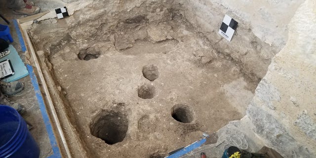 The excavation of the monks' burial room.