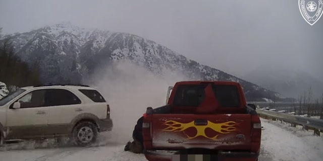 A tow truck driver was nearly struck by an SUV on Christmas Day in Alaska.