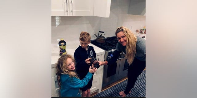 Walsh Jennings, pictured with two of her children, said providing a good nutritional example for her kids is a key part of her parenting.