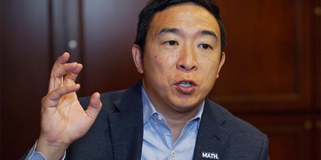 In this Dec. 5, 2019, photo, Democratic presidential candidate businessman Andrew Yang speaks during an interview with The Associated Press in Chicago. (AP Photo/Teresa Crawford)