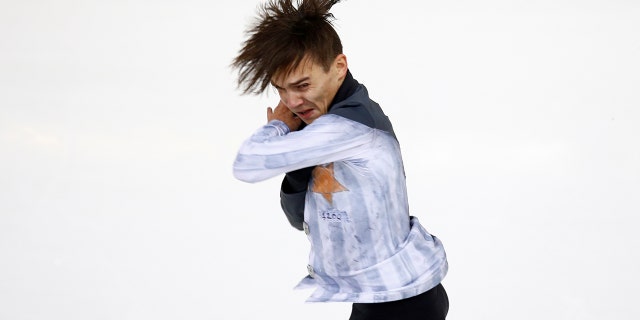 Anton Shulepov wears his concentration camp outfit at the ISU Grand Prix of Figure Skating on November 2, 2019. (REUTERS/Emmanuel Foudrot)