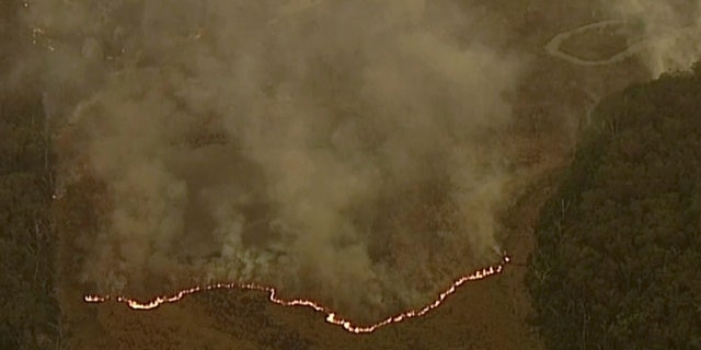 In this image made from video, an aerial view shows wildfires in the forests of Gippsland, Victoria, Australia, Dec. 31, 2019.