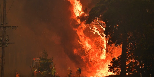 A fire truck is seen during a bushfire near Bilpin, 56 miles northwest of Sydney, on Dec. 19, 2019.