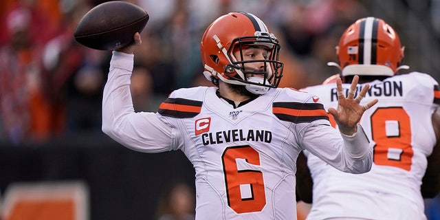 Cleveland Browns quarterback Baker Mayfield throws during the first half of an NFL football game against the Cincinnati Bengals, Sunday, Dec. 29, 2019, in Cincinnati. (AP Photo/Bryan Woolston)